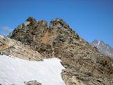 Via Normale Cima di Caspoggio - Al centro, dove finisce la neve, lultimo tratto di cresta SE e la vetta (la punta a destra)