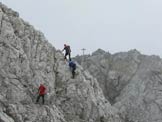 Via Normale Creta di Collina - La croce di vetta salendo alla Cjanevate